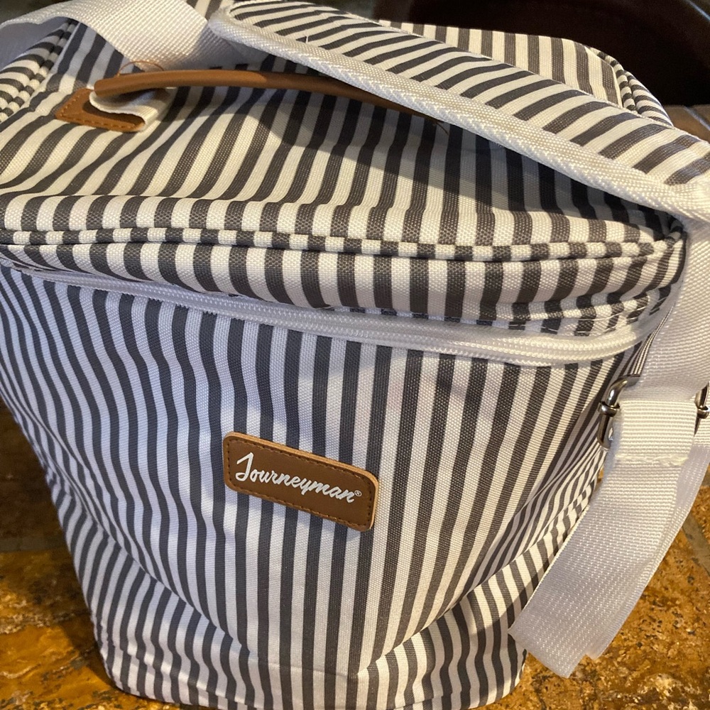 Black and White Striped insulated food and drink carrier.